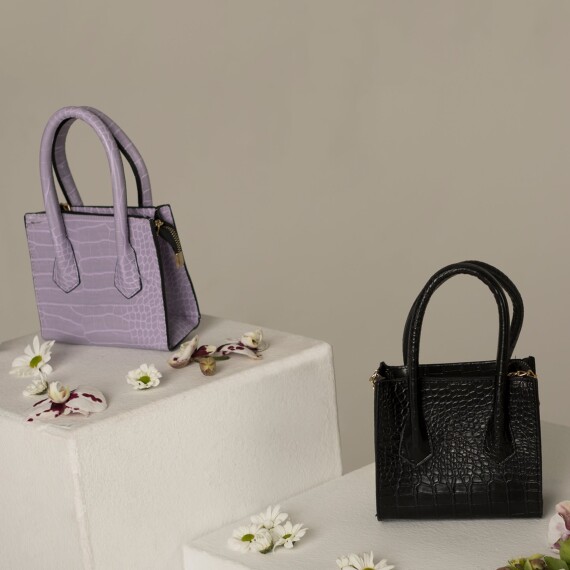 https://sh.kyveli.me/products/purse