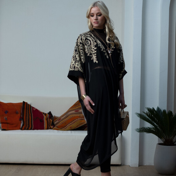 https://sh.kyveli.me/products/adornment-abaya